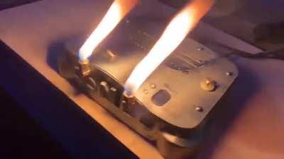 Guy builds all-metal fire-spewing N64 with rotating logo