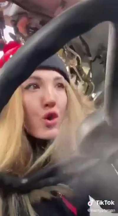 Ukrainian woman teaches her people how to operate an abandoned Russian tank on TikTok