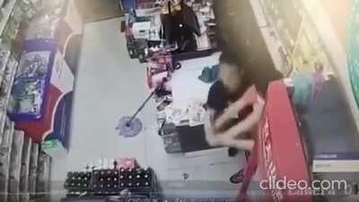 Guy tries to rob a store with a knife and is given several bottles for the trouble. Like, a lot of bottles. So many.