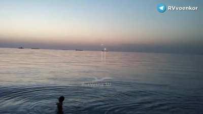 UA child playing in water when a Russian ship fires its missiles.