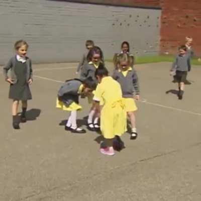 Girl comes back to school with her new leg and sees all her friends.