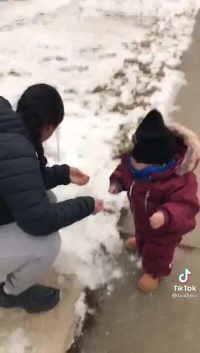 His first snowball fight