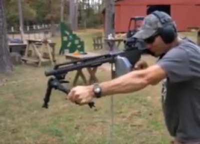 This belt-fed .22 cal machine gun looks like loads of fun