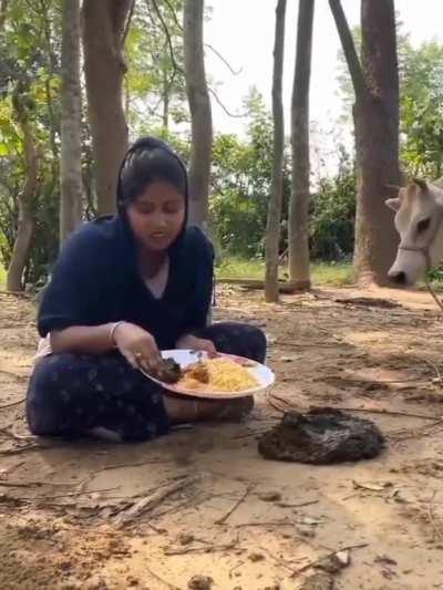 Sick 🤮🤢 Sad to see people being brainwashed by religious gurus and fraud baba. Is cow dung edible and is it good for health? Brainless people...