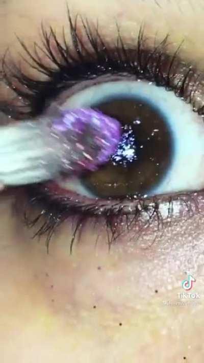 She’s wearing contacts but I can’t help think about all that glitter stuck in her eyes!