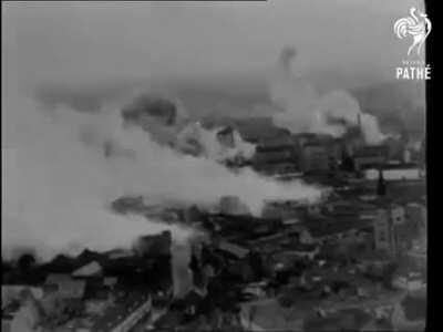 Nearly 100 RAF light bombers, including Mosquitos, Bostons and US built Venturas participate in a low level daylight raid of the Nazi-held Phillips Wireless Valve and Radio Factory in Eindhoven, Holland in 1942. Includes bomb damage photos and video of da