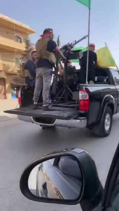 Hezbollah troops mobilizing to go fight in Beirut.