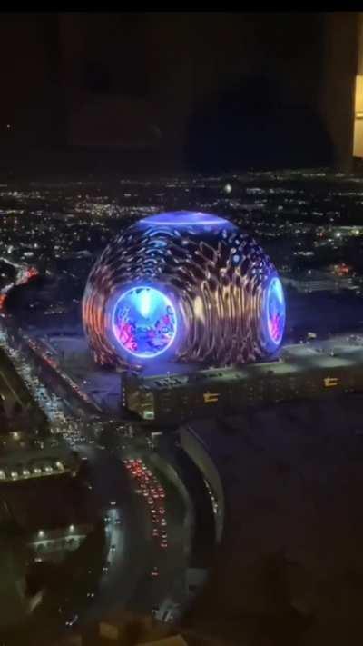 The Sphere at The Venetian Resort in Paradise, Nevada, has an exosphere made of LED light panels which is visible from several miles away. 
It's being tested in these days and it's quite stunning