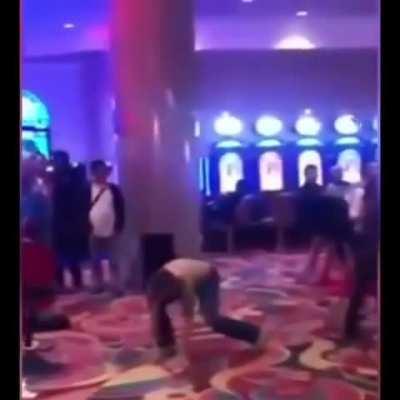 Guy rips off shirt and gets destroyed in a casino