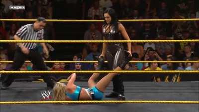 Aksana performing her leg split on Emma