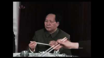Kim Il sung eating food with Mao Tse Tung (1958)