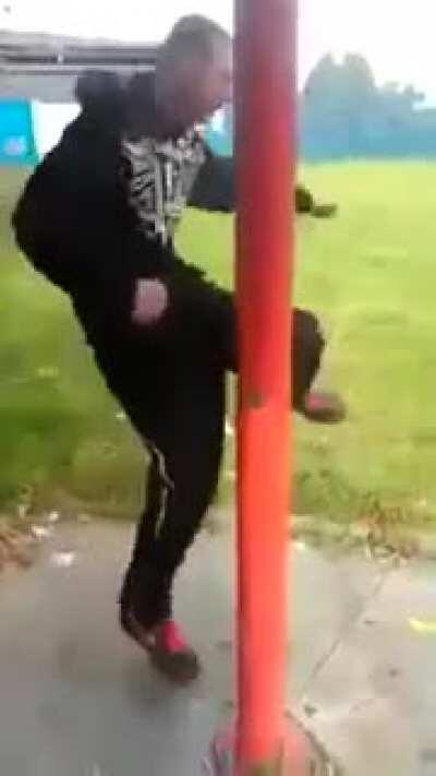 Shin kick against a metal pole.