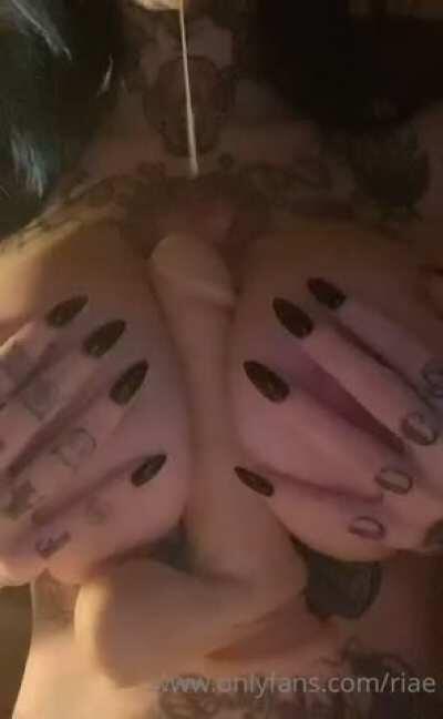 Riae titty fucking a dildo