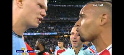 Haaland and Gabriel Jesus share a few words after the game.