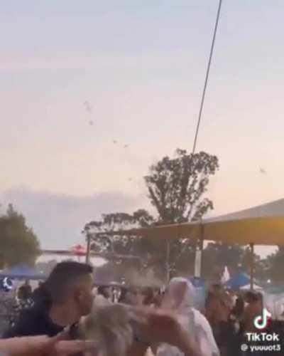 View from the music festival when Hamas motorized paragliders rolled in.