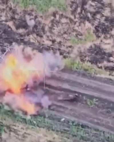 Two Russian soldiers try to shoot down a Ukrainian FPV drone, but the drone hits them anyways  (Kharkiv Oblast, June 2024)