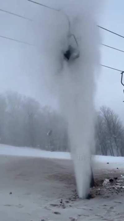 Stuck on ski lift above Broken pipe