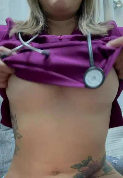 No bra under my scrubs today. what do you think