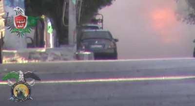 Opposition RPG gunner attempts to engage an SAA tank, causes civilian vehicle to cook off in stead - September 2012