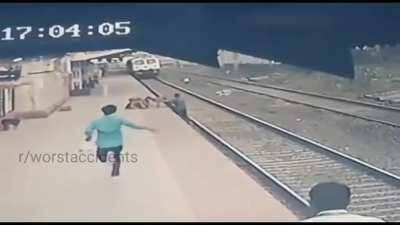 Guy Saves Blind Mother's Kid After The Child Falls On The Tracks