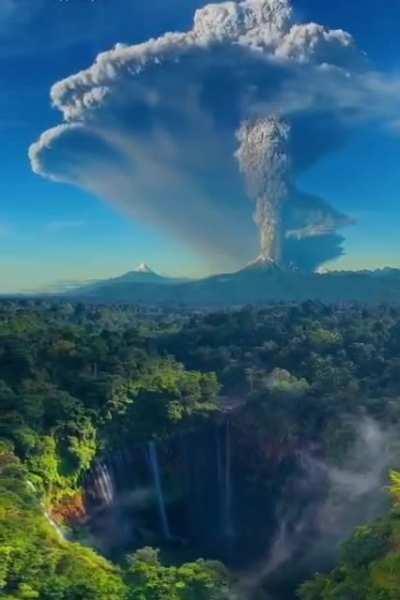 Semeru Mountain volcanic erruption 2 days ago captured from afar (also visible is Tumpak Sewu Waterfalls)