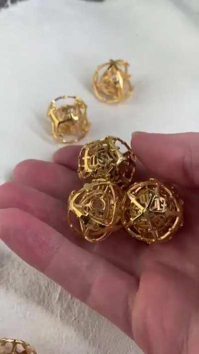 I'm giving away a set of my gold plated Arcana Core Dice! Just comment on this post to enter. [Art] [OC] (Mod Approved)