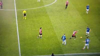 Alexis Saelemakers (Milan) chasing for the ball as the Inter Milan players nutmeg him and pass it around him