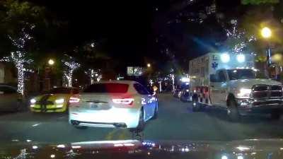 Impatient Maserati almost hits multiple cars at the scene of a crashed Lamborghini in downtown Atlanta