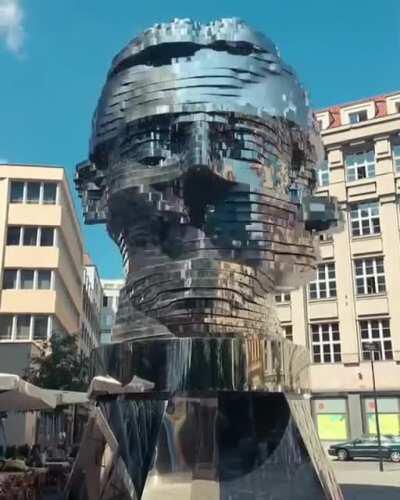 Rotating 42 Layer sculpture of Franz Kafka Head By David Cerny