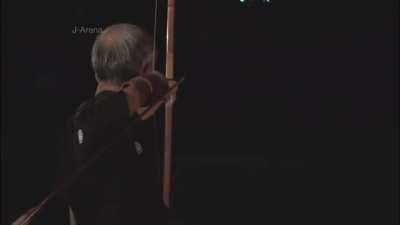 Traditional Japanese archer hits target in complete darkness