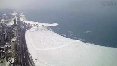 Video shows huge ice breaking away from Lake Michigan.