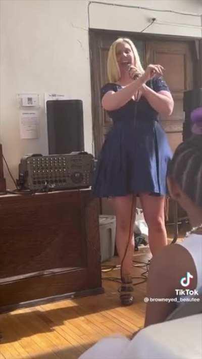 Bride's drunk friend gives wedding speech, assures everyone she's not racist