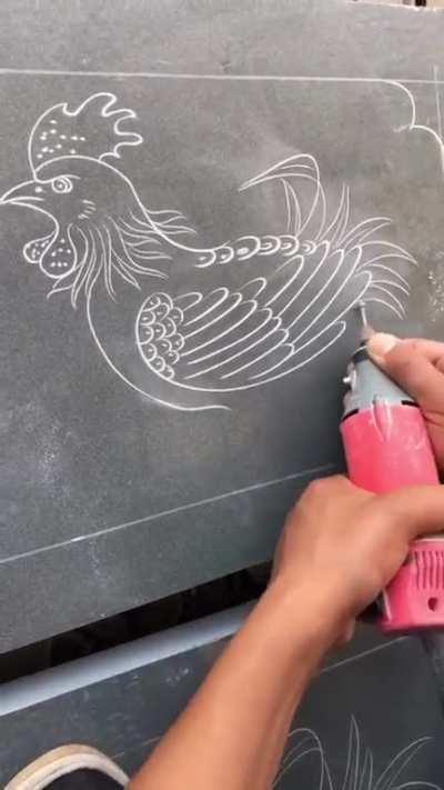 Dremel rooster art on stone