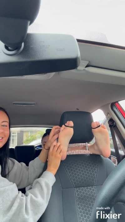 Elisha tickled by Tia in the car