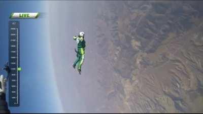 Man skydiving from 25,000 ft without a parachute to land on a net