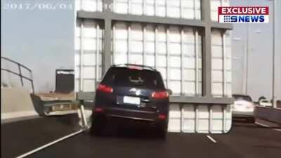 Sign Falls Onto Freeway, Melbourne, Australia 9/1/19. One injured.