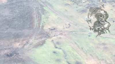 Russian soldiers charge across open field, with the expected result. Bakhmut, Ukraine