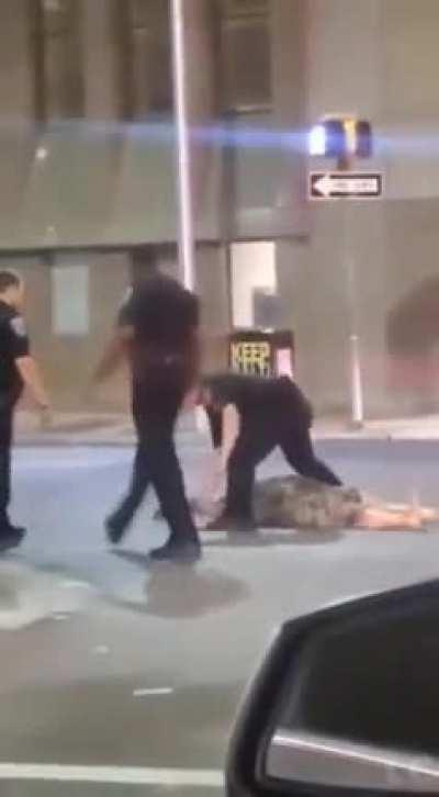 Woman punches a cop not once but twice and gets dropped like a sack of ****