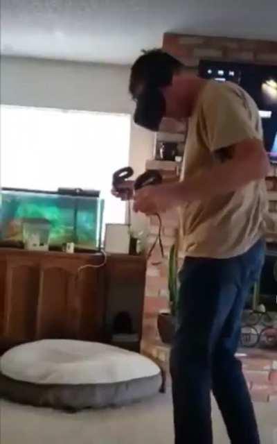 Dad on the edge of a cliff in virtual reality