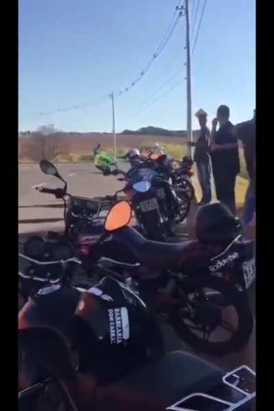 Biker controling his bike after nearly crashing wheelie