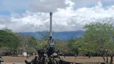 Colombian army shells guerilla position with a 155mm howitzer