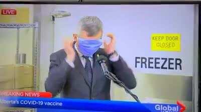 Paul Wynnyk chair of the covid vaccine task force and his tricky mask