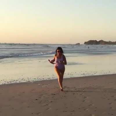 Geraldine running on the beach