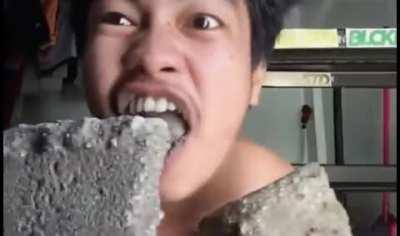 Can someone help me find the original video of this asian guy eating concrete?