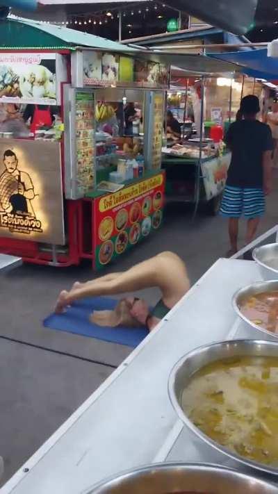 The food market is a perfect place for me to practice yoga.