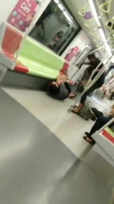 Man gets beatdown on Singapore subway