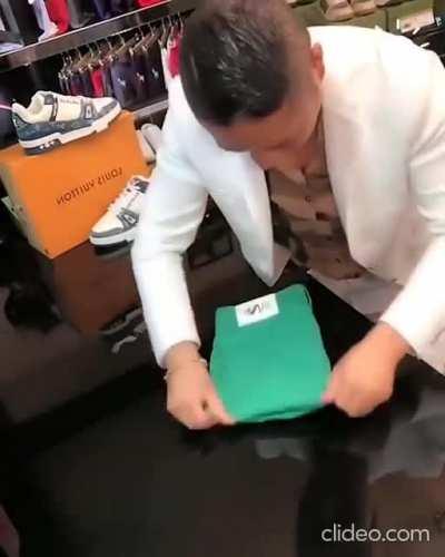 The way he folds these clothes