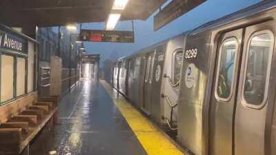 Trains in the thunderstorm this evening at Marcy Avenue