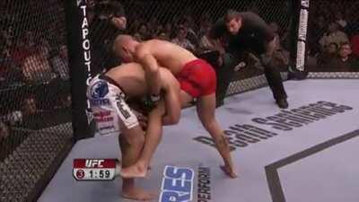 4x D1 All-American Josh Koscheck grabs a hold of GSP's leg for a good 25 seconds, tries to take him down, but Georges demonstrates tremendous balance and TDD and ends up on top