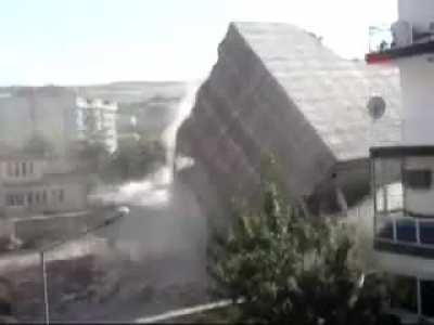 Demolishing a building.